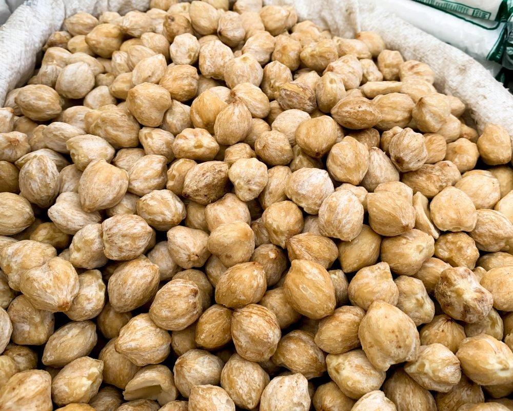 Candlenut (Aleurites moluccana (L.) Wild.), is a plant whose seeds are used as a source of oil and spices. candlenut sold in the market